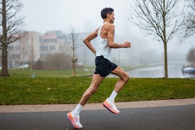 Noah running along a misty canal